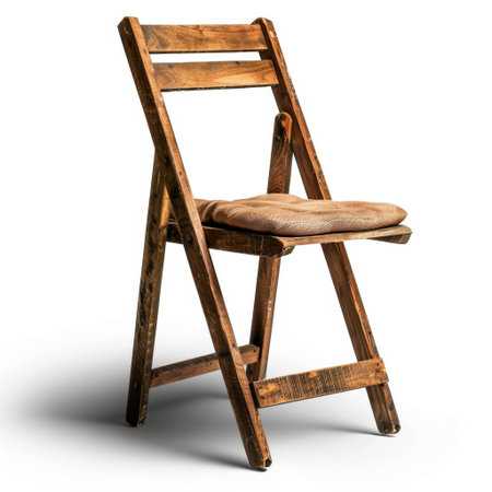 A vintage wooden folding chair featuring a soft cushion, perfect for enhancing cozy interiors, rustic aesthetics, or unique photography setups showcasing craftsmanship.の素材