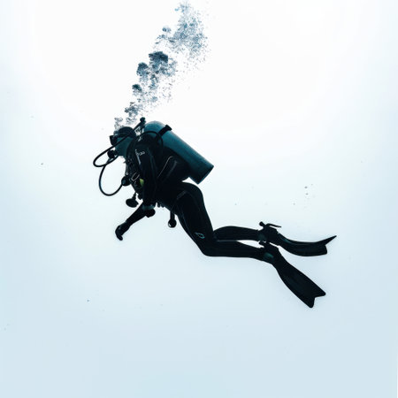 A serene image of a diver exploring the underwater realm, creating bubbles as they descend. This photo captures the beauty and tranquility of ocean adventures.の素材