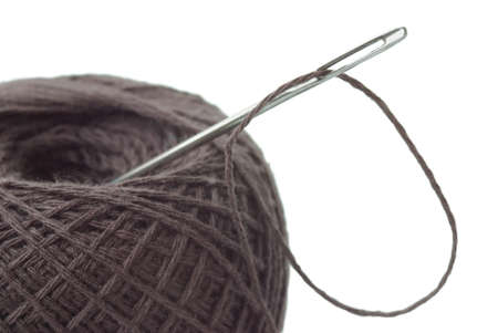 tucked into the needle thread