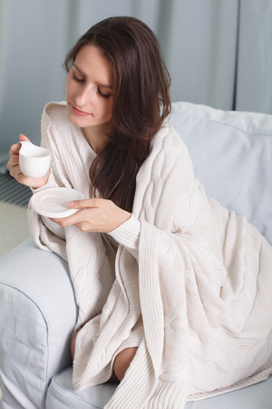portrait of a girl with a cup of coffeeの写真素材