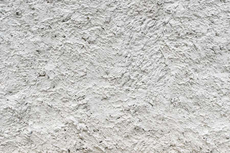 Fine white texture of construction plaster on the wall.の写真素材