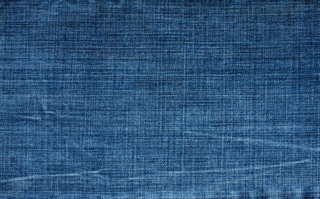 texture of dark blue denim. Focusing in the center of the frame.の写真素材