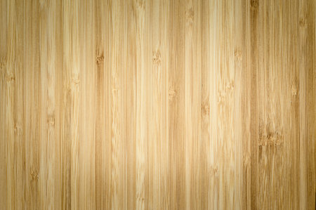 Wood texture with dark corners and light center. There is free space for text. Vertical wood fibers. Focusing in the center of the frame.の写真素材
