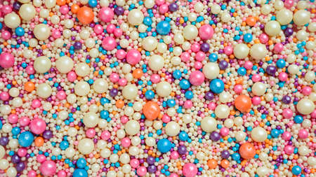 Many small multi-colored balls.