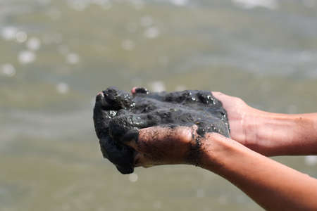 Black mud for medical and spa treatments. Mud and silt from a salt lake in Crimea.