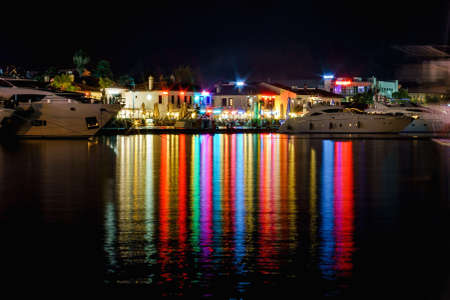reflection in the sea of âânight lights of the city of Marmarisの写真素材