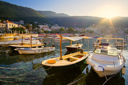 Morning in the port of Montenegro. Fishing boats stand on the pier.の写真素材