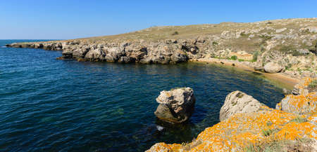 Panoramic view of the rocky coast of the Black Sea. Wild beach in the sea bay.の写真素材