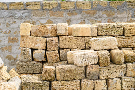 Natural shell rock building material. Blocks made of environmentally friendly construction site.の写真素材