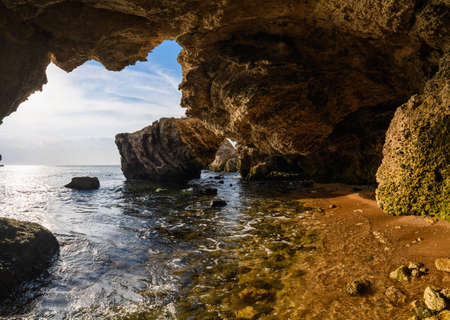 Large karst cave on the seashore. Beautiful panorama of the caveの写真素材