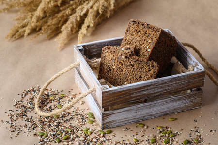 Sourdough rye bread in a wooden gift boxの写真素材