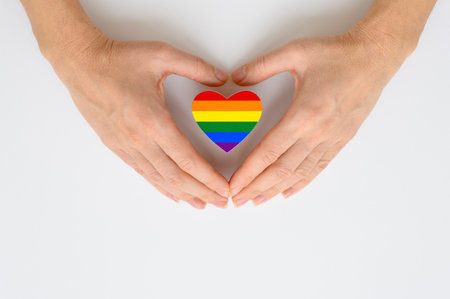 Gay praid flag in hand. Human equality concept.の写真素材