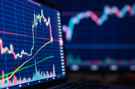 Background on a financial theme. Trader charts on monitors. selective narrow focus.