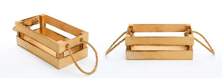 Empty wooden box with ropes for a gift or flowers on a white background. two angles.の写真素材