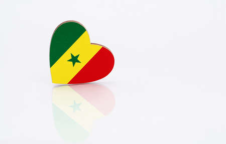 Flag of Senegal in the shape of a heart on a white background. The concept of patriotism. copyspace.の写真素材