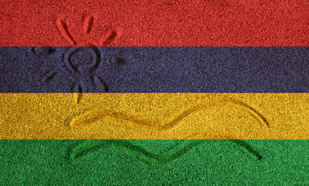 Flag of Mauritius on the sand. Sun and sea waves painted on the sand. Vacation concept in the resorts of the Mauritius.の写真素材