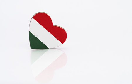 Flag of Hungary in the shape of a heart on a white background. The concept of patriotism. copyspace.の写真素材