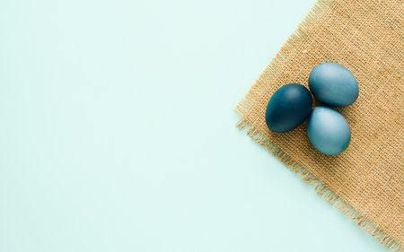 Easter eggs on a blue background. copy spaceの写真素材
