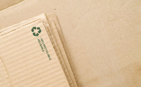 Cardboard with recycling sign. Eco-friendly recycled materialの写真素材