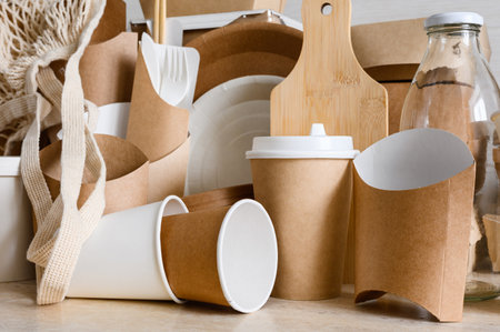 A set of paper and wood items for food delivery or a picnic. Using eco-friendly materials to protect the environment from debris.の写真素材