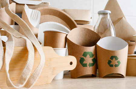 The concept of recycling and zero waste. Eco-friendly items made from biodegradable materials with a recycling sign.の写真素材