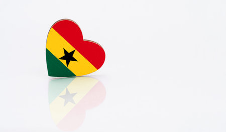 Flag of Ghana in the shape of a heart on a white background. The concept of patriotism. copyspace.の写真素材