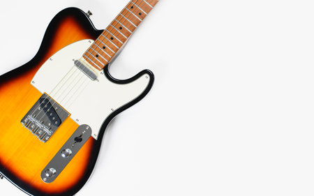 Retro electric guitar on white background. Copy space. Flat lay. Musical themeの写真素材