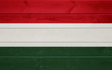 Flag of Hungary on an old wooden surface.の写真素材