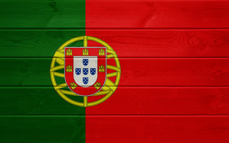 Portugal flag on an old wooden surface. Wood textureの写真素材