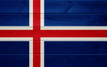 Iceland flag on an old wooden surface.の写真素材