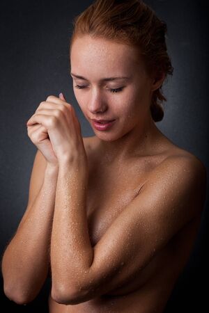 girl with water drops on the skinの写真素材