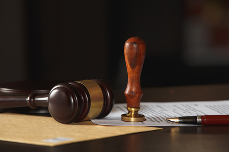 Judge gavel with lawyers advice legal at law firm in background. Concepts of law.の写真素材