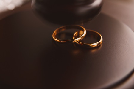 Closeup of male hand signing divorce papers.の写真素材