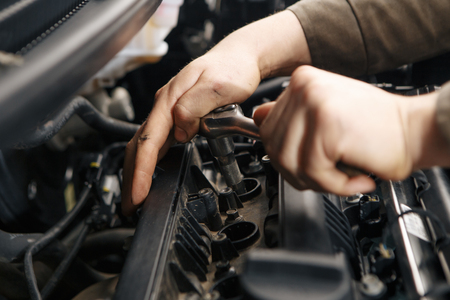 Professional mechanic checking car engineの写真素材