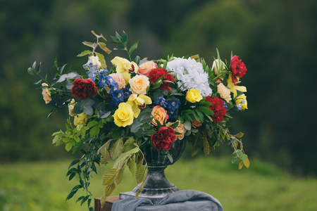 Arch for the wedding ceremony, decorated with cloth and flowersの写真素材
