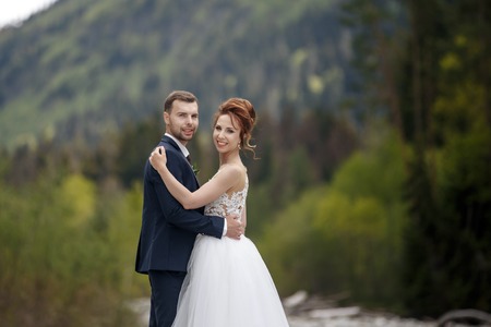 Happy bride and groom after wedding ceremonyの写真素材