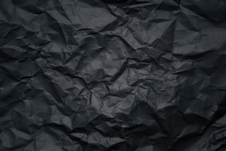 Blank crumpled black paper black mold conceptの写真素材