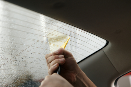 Car window tinting series : Installing car window tintの写真素材