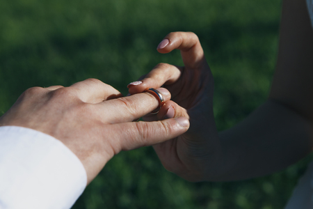 Man giving an engagement ring to hisの写真素材