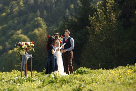 White flowers decorations during outdoor wedding ceremonyの写真素材