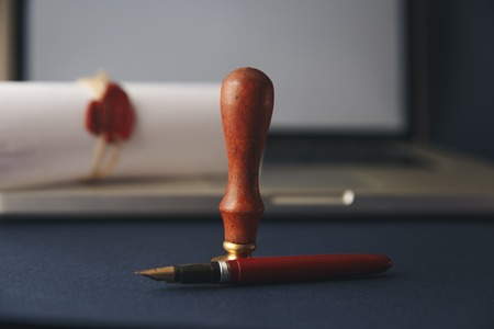 working space of lawyer with law gavel ,laptop ,legal book and brass scale of judge. lawyer and law ,judiciary and legislature courtroom legal concept. top view flatlay lawyer background.の写真素材