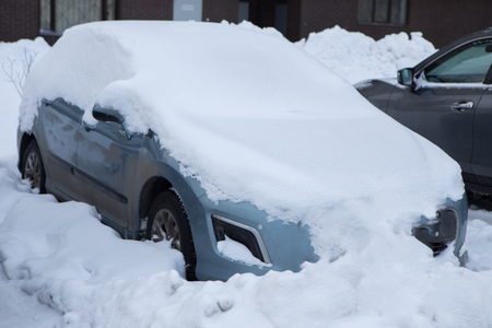 the cars on the parking under snowの写真素材