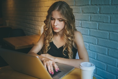 Teenage Girl Victim Of Online Bullying With Laptopの写真素材