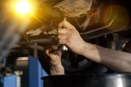 Car mechanic working at automotive serviceの写真素材