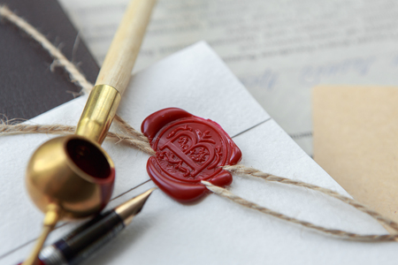 Old notarial wax seal on tied scroll, closeupの写真素材