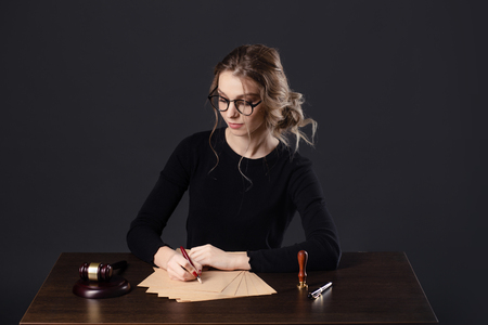 Lawyer business women working and notary signs the documents at office. consultant lawyer, justice and law ,attorney, court judge, conceptの写真素材