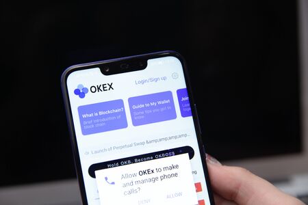 Tula, Russia - November 28, 2018: OKEx logo displayed on a modern smartphone