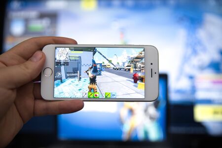 Tula, Russia - JANUARY 27, 2019 - Fortnite video game screen with character and console controller....
