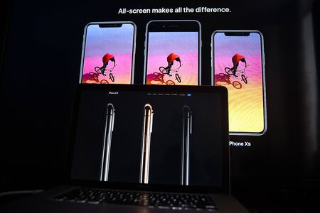 Tula, Russia - JANUARY 27, 2019 - Blurry image of iPhone XR on smartphone and tablet