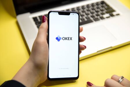 Tula, Russia - August 28, 2018: OKEx logo displayed on a modern
